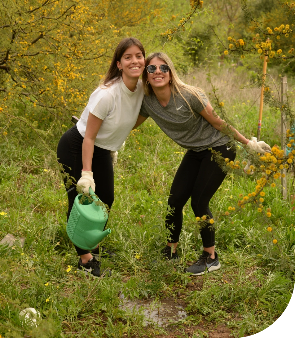 Colleagues from MetLife Argentina participate in a tree-planting event.